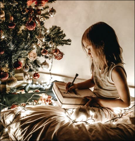 little girl writing a letter to Santa