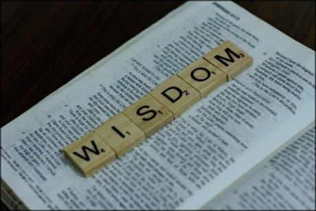 sign that says wisdom