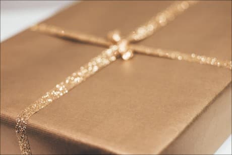 gold box with gold ribbon