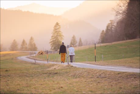 inspirational picture of two grandparents walking down a path