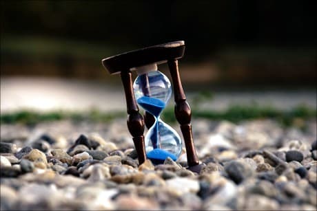 timer filled with sand, an hourglass
