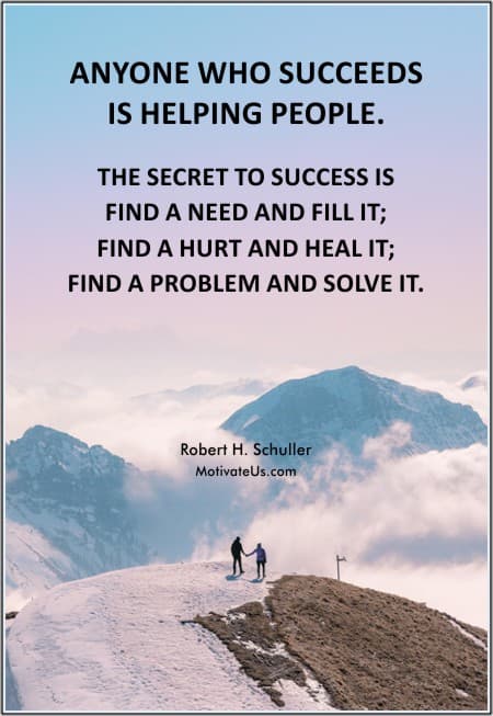 two people on top of a mountain