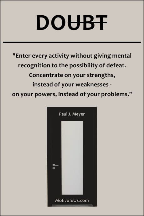 a door and a sign with a quote by Paul J. Meyer