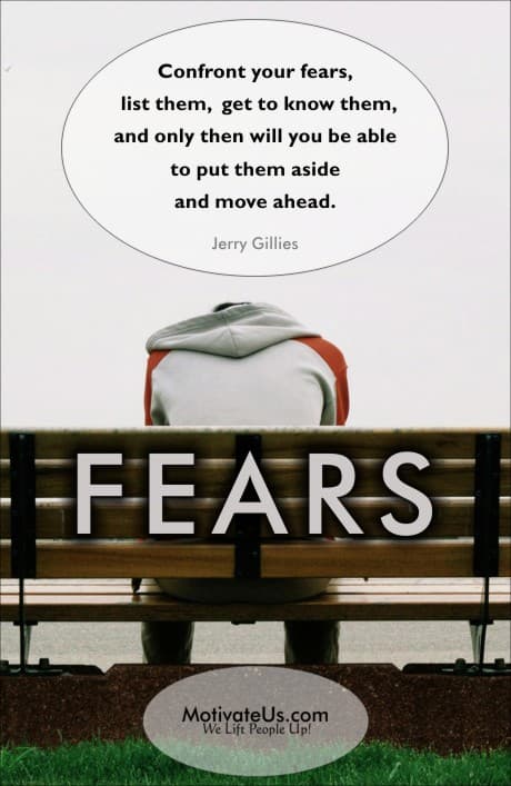 person sitting on a bench with their head down