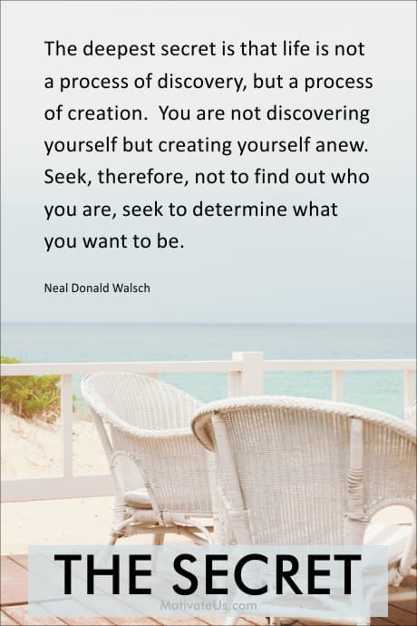 two chairs on a deck overlooking the water