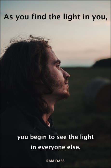 person looking off in the distance and a quote by Ram Dass