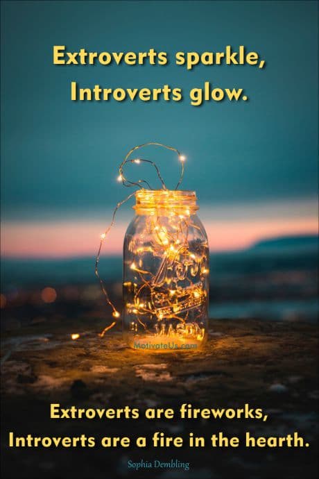 quote about introvert or extrovert on picture of clear glass jar with lights in it.