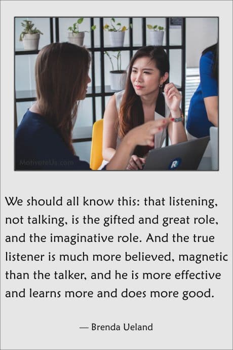 two women sitting, one talking, one listening