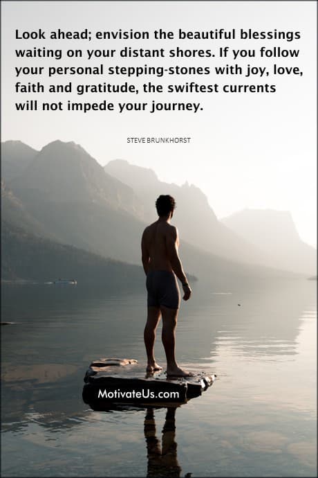 person standing on a big rock looking out at the water, searching for information