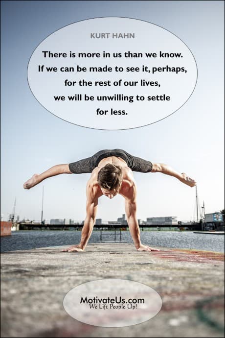 person balancing on their arms with their feet sticking out sideways and a quote by Kurt Hahn - founder of Outward Bound