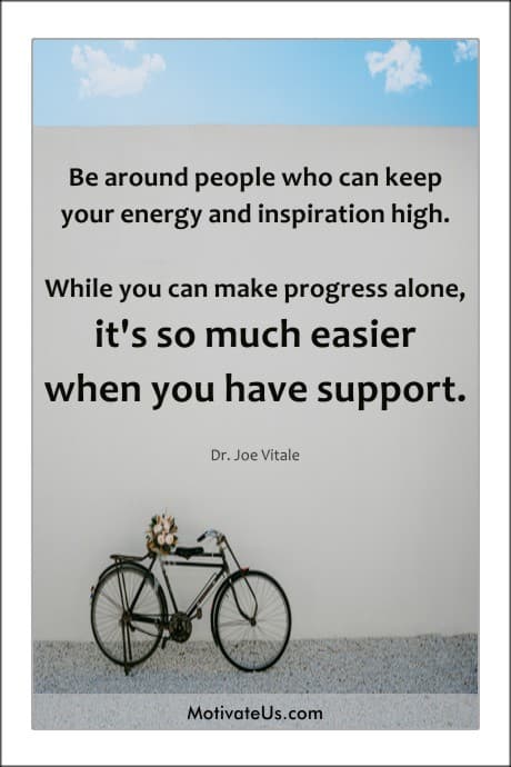 a bicycle against a wall and a quote by Dr. Joe Vitale