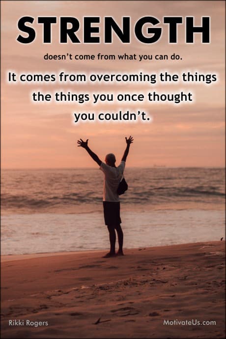 Quote about strength and overcoming with a man on the beach with his arms raised up