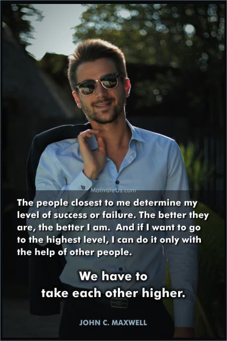 man with sunglasses and a jacket thrown over his shoulder