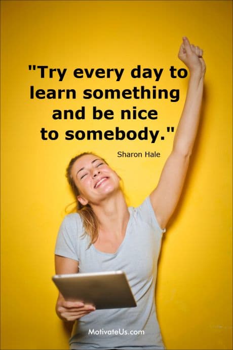girl smiling holding an ipad and an inspiring quote on a yellow background