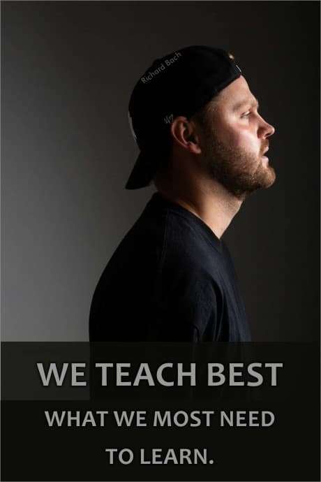 What We Teach Others Often Teaches Us Too man standing in the light.