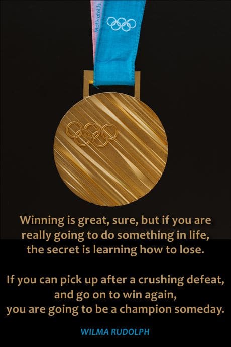 an Olympic Gold medal and a quote by Wilma Rudolph