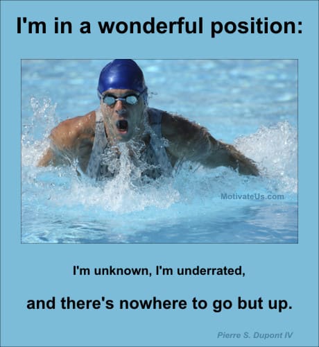 A Picture: (Man Swimming In Competition with The Quote:  quote1 on it.