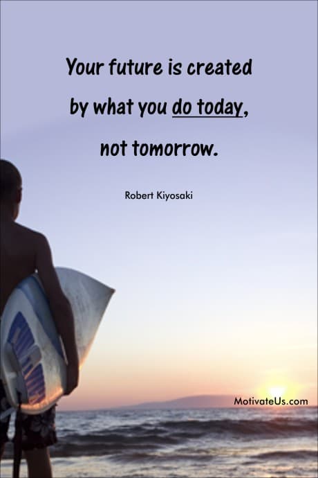 person carrying a surfboard 