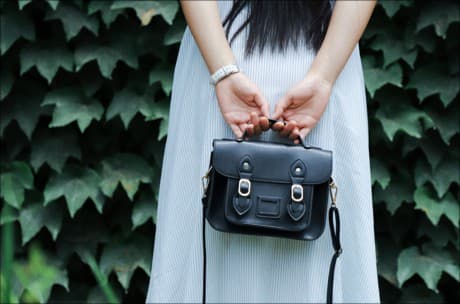 woman holding a purse