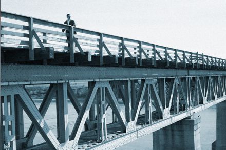 Miles Patrick Yohnke - walking on a bridge.