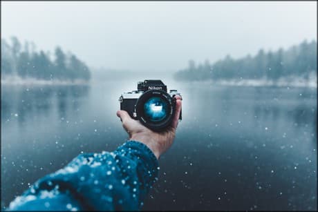 camera aimed at person