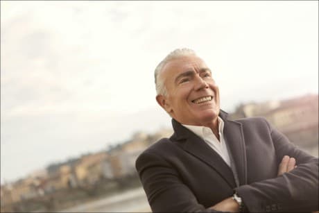 older man arms crossed