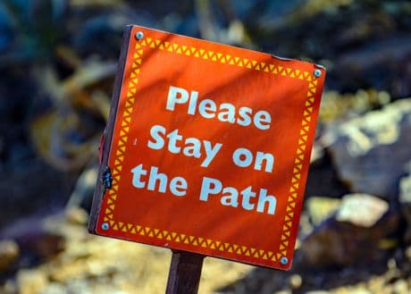 4 steps to take to turn mistakes around. sign that says please stay on the path.