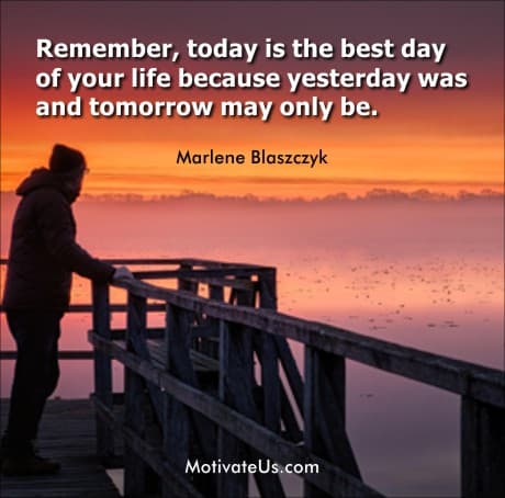 person looking out over the snowy lake